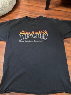 Thrasher Black Tee with Red and vintage Yellow Flame Logo